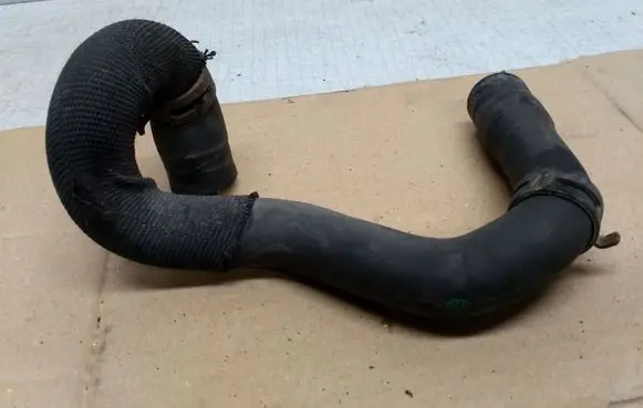 Volkswagen Transporter - Caravelle T5 Engine coolant pipe/hose 7H0122157CN