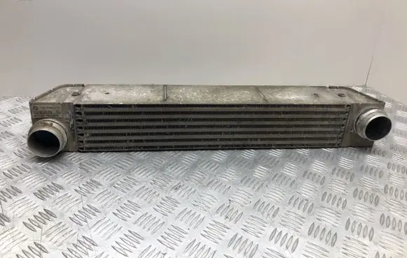 BMW 5 E60 E61 Intercooler radiator 7795823 F6438000