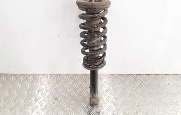 Mitsubishi Pajero Front shock absorber with coil spring MR554292