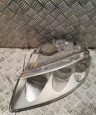 Volkswagen Touareg I Headlight/headlamp 7l6941015ce