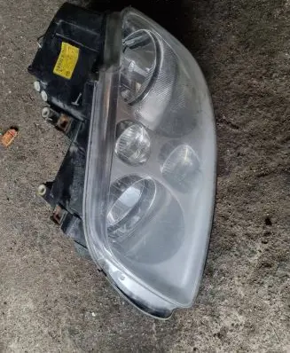 Volkswagen Touran I Headlight/headlamp 1T0941005F 0301205201