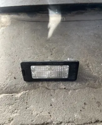 Volkswagen Golf Plus Number plate light 5N0943021