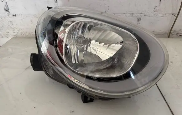 Fiat 500X Headlight/headlamp 00519784140 03C712