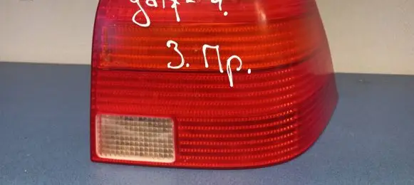 Tail light bulb cover holder