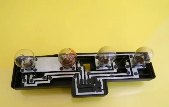 Tail light bulb cover holder