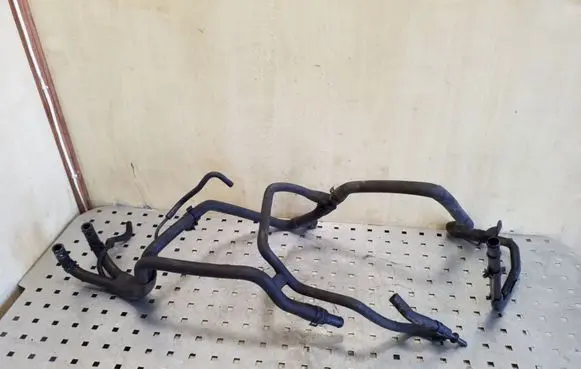 Volkswagen Touareg I Engine coolant pipe/hose
