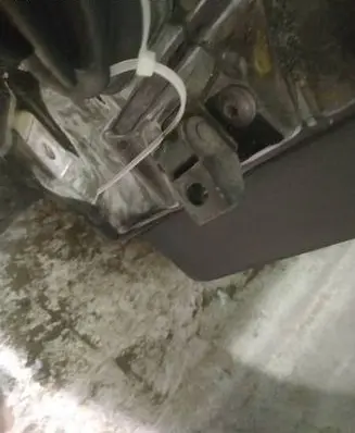 Rear door check strap stopper