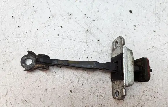 Front door check strap stopper