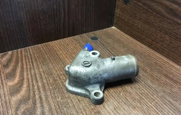 Thermostat/thermostat housing