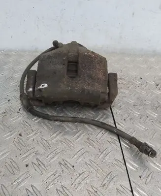 Volkswagen Golf VI Front brake caliper