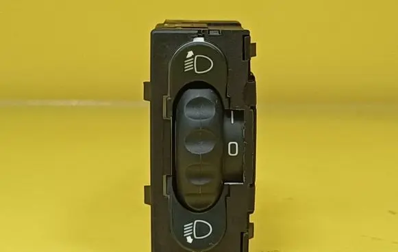 Headlight level height control switch
