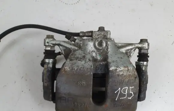 Volkswagen Golf VII Front brake caliper