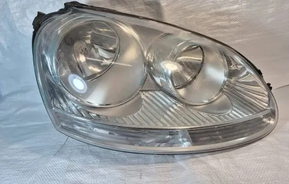 Volkswagen Golf V Headlight/headlamp 1K6941006N 16591660 0301212204