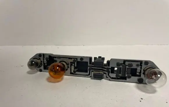 Volvo S60 Tail light bulb cover holder 153852