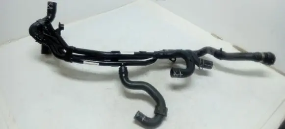 Volkswagen Golf VII Engine coolant pipe/hose 5Q0121064BS 5Q0121065F