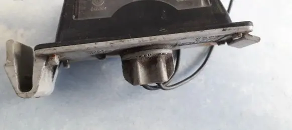Mazda 323 Number plate light