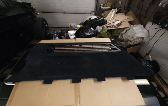 Trunk/boot lower side trim panel