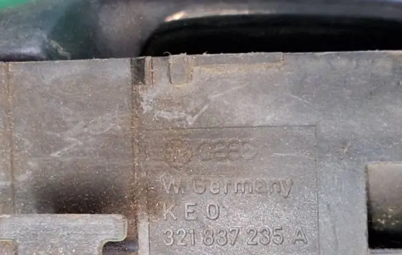 Volkswagen Golf II Front door interior handle 321837235a