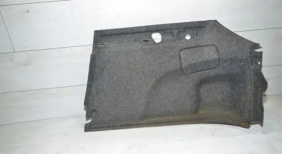 Trunk/boot lower side trim panel