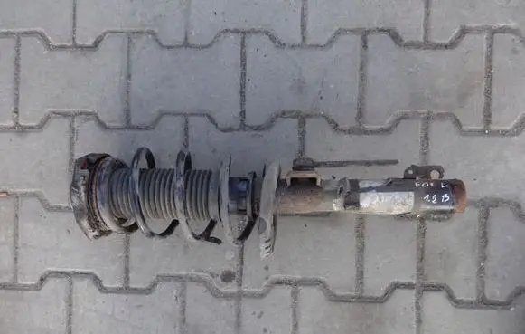 Volkswagen Fox Front shock absorber with coil spring
