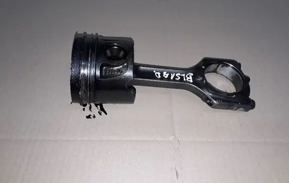 Cadillac BLS Piston with connecting rod 664