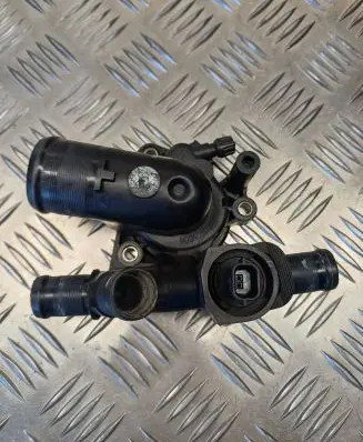 Thermostat/thermostat housing