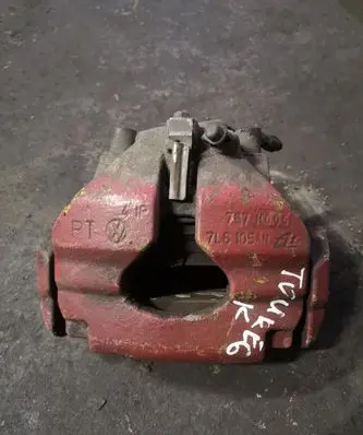 Volkswagen Touareg I Front brake caliper 7L6105AN