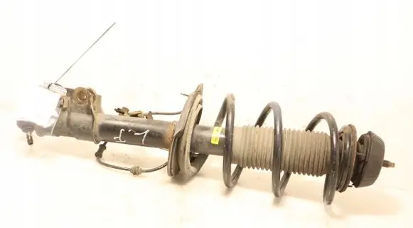KIA Venga Front shock absorber with coil spring G7704