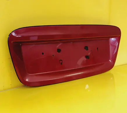 Trunk door license plate light bar