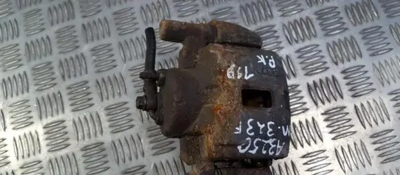 Mazda 323 F Front brake caliper