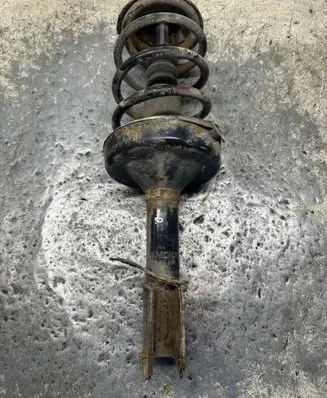 Renault Kangoo I Front shock absorber with coil spring