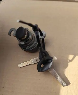 Saab 9-3 Ver2 Coupe door lock (next to the handle) 12336 L233A