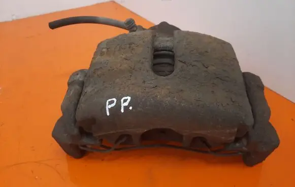 Volkswagen Touran I Front brake caliper