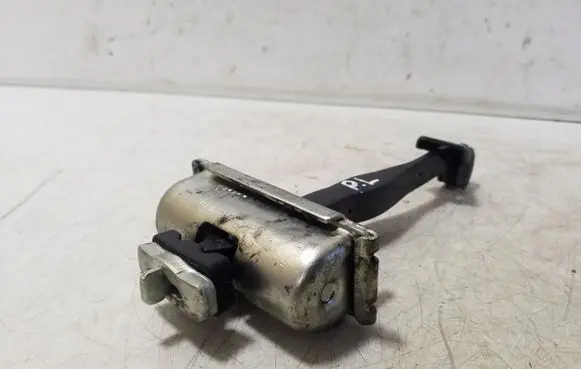 Front door check strap stopper