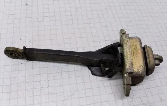 Volvo S40, V40 Front door check strap stopper
