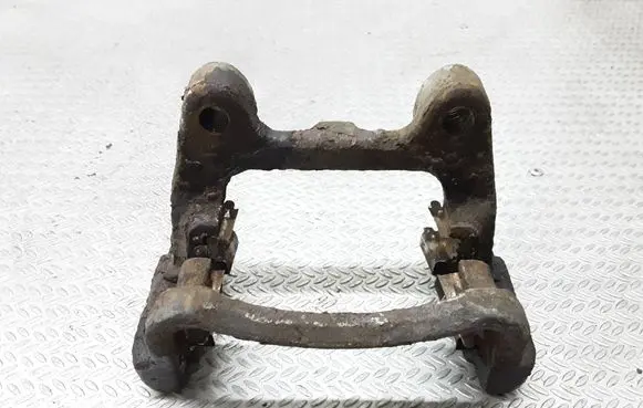 Volkswagen PASSAT B6 Brake caliper pad carrier rear 