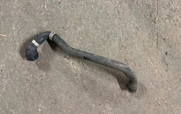 Volkswagen Golf VII Engine coolant pipe/hose 5Q0122157DE