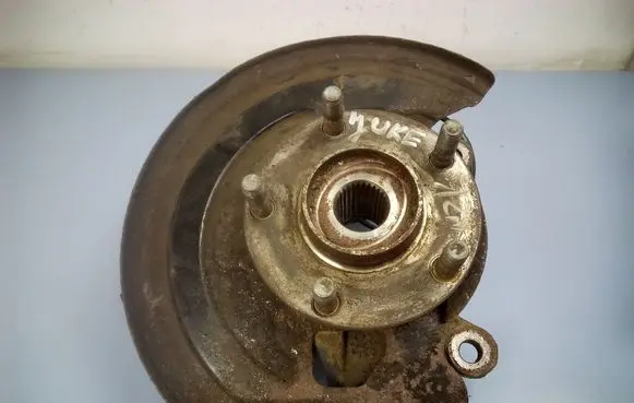 Nissan Juke I F15 Front wheel hub spindle knuckle 400141KK0H