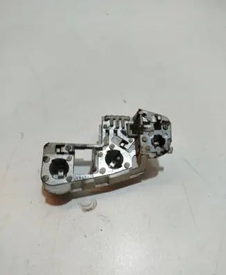Tail light bulb cover holder