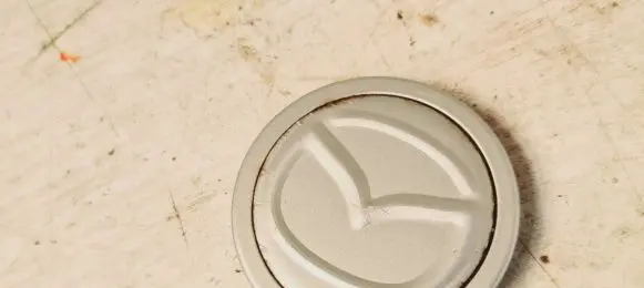 Mazda 2 Non-original wheel cap 