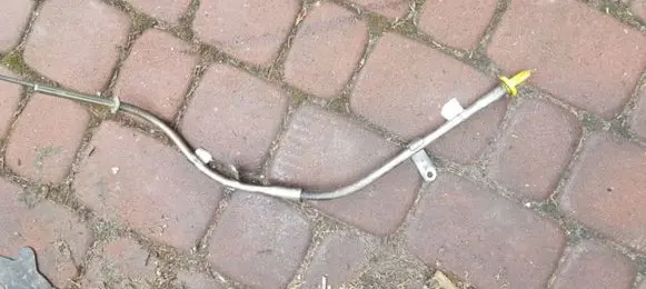 Oil level dip stick