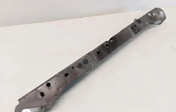 Top upper radiator support slam panel