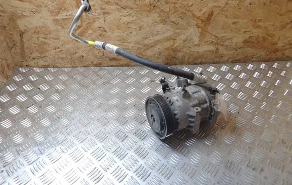 KIA Sportage Air conditioning (A/C) compressor (pump) 97701D7300