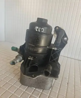 Oil filter mounting bracket