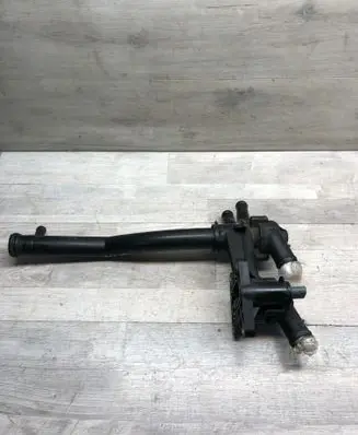 Volkswagen Golf VI Thermostat housing 03C121065B