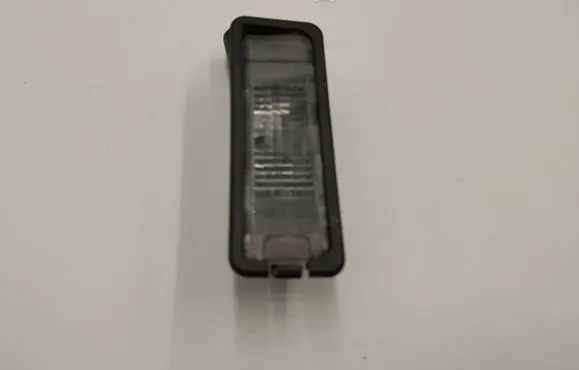 Volkswagen Golf VI Number plate light 1K8943021