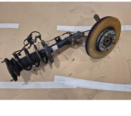 Front wheel hub spindle knuckle