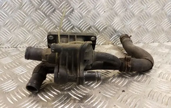 Thermostat/thermostat housing