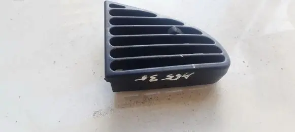KIA Spectra Dash center air vent grill