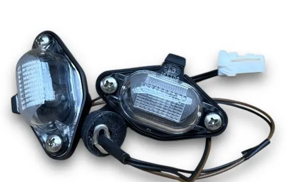Nissan Micra Number plate light 265101F500